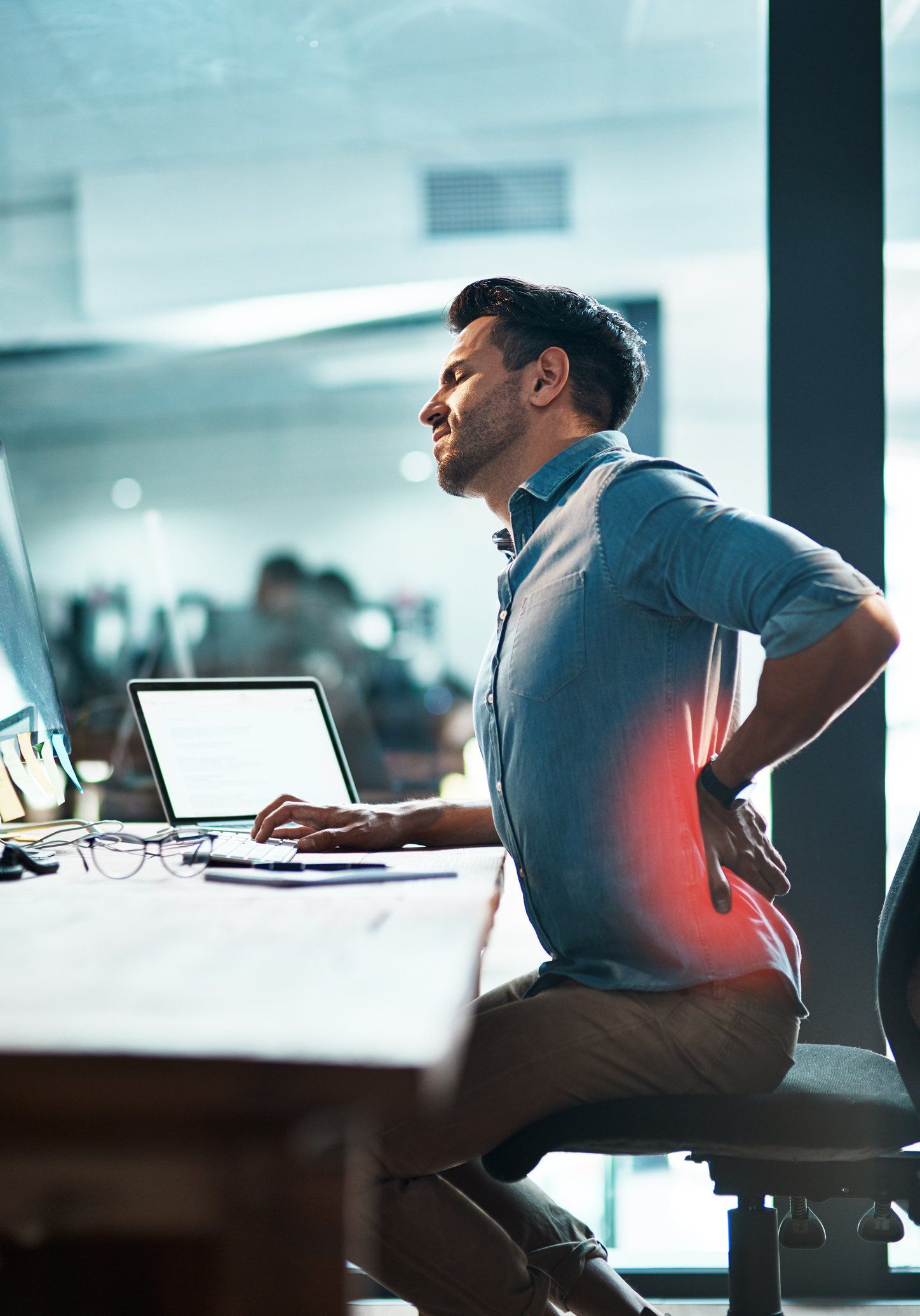 Man with Lower Back Pain — Santa Monica, CA — Active Therapy Center Man with Lower Back Pain — Santa Monica, CA — Active Therapy Center